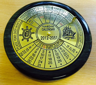 Forty Year Brass Calendar Paperweight with Marble Base