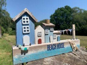 Wooden Beach House Coastal Scene