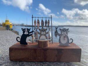 Cats at a Coastal Fish Market