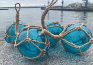 Four Turquoise Glass Fishing Floats