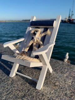 nautical decor for seaside themes - wooden deck chair