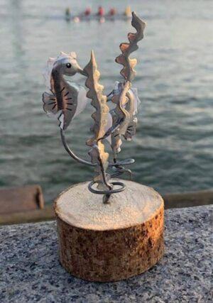 Pair of Tin Seahorses on Wood