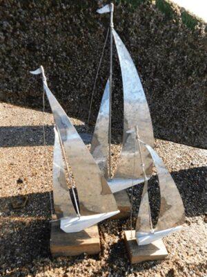 Three Silver Coloured Sailboats